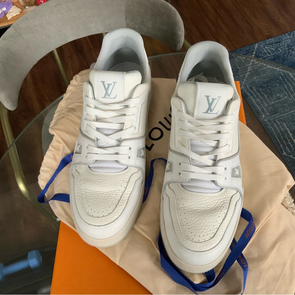 All white LV Trainers - worn twice. Like new. No scuffs or stains.